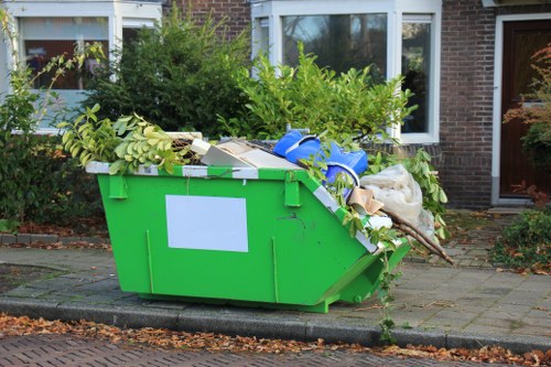 Waste clearance truck at a construction site